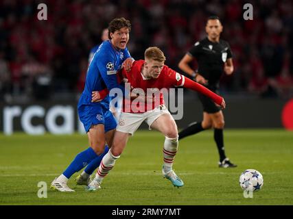Rangers' Sam Lammers (left) and PSV Eindhoven's Jerdy Schouten battle for the ball during the UEFA Champions League play-off second leg match at the Philips Stadium, Eindhoven. Picture date: Wednesday August 30, 2023. Stock Photo