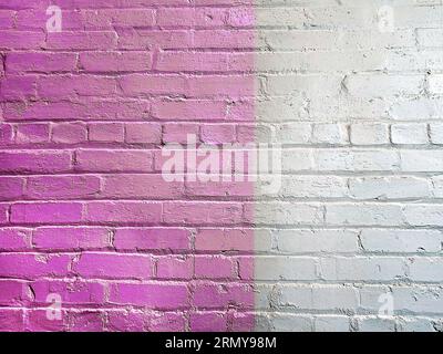 Two-tone pink and silver gray painted brick wall Stock Photo