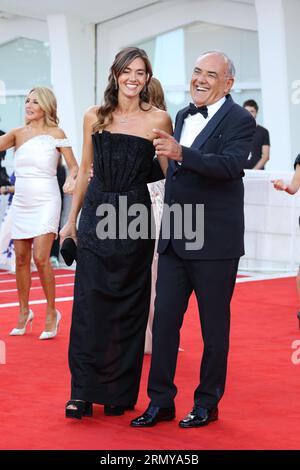 Lido Di Venezia, Italy. 30th Aug, 2023. Giulia Rosmarini and Director of the Festival Alberto Barbera attend the opening red carpet at the 80th Venice International Film Festival at on August 30, 2023 in Venice, Italy. © Photo: Cinzia Camela. Credit: Live Media Publishing Group/Alamy Live News Stock Photo