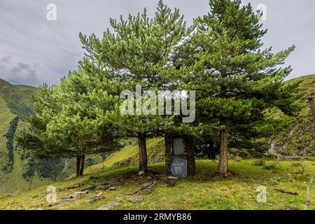 The village of Dano near Dartlo in Tusheti, Georgia. Memorial stone for the war dead of the village Stock Photo