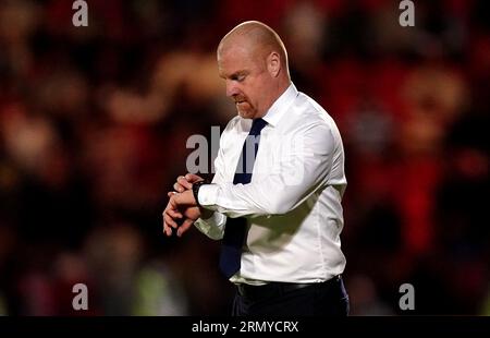 Everton manager Sean Dyche checks his watch during the Carabao Cup second round match at the Eco-Power Stadium, Doncaster. Picture date: Wednesday August 30, 2023. Stock Photo
