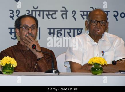 Mumbai, India. 30th Aug, 2023. L-R Shiv Sena (UBT) chief Uddhav Thackeray and Nationalist Congress Party (NCP) chief Sharad Govindrao Pawar are seen during the Maha Vikas Aghadi (MVA) press conference in Mumbai. The press conference was held ahead of Indian National Developmental Inclusive Alliance (INDIA) third meeting to be held on 31st August and 1st September 2023. Credit: SOPA Images Limited/Alamy Live News Stock Photo