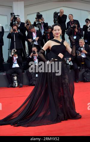 Venice, Italy. 30th Aug, 2023. VENICE, ITALY - AUGUST 30:Li Mengattends the opening red carpet at the 80th Venice International Film Festival on August 30, 2023 in Venice, Italy. Credit: dpa/Alamy Live News Stock Photo