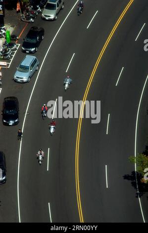 Aerial view of street with people riding motorbikes in Taichung, Taiwan Stock Photo