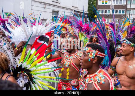 London, UK. 28th Aug, 2023. The colorful crowd is dancing, singing and walking on the parade of the Notting Hill Carnival in London. The Notting Hill Carnival is one of the biggest street festivals in the world. It started in 1966 but originated with the Caribbean Carnival organised in 1959 with the immigrant community from Trinidad and Tobago. This year the Notting Hill Carnival marks the 50th anniversary of the introduction of the sound systems and Mas bands. Also it marks the 75th anniversary of the arrival of the passengers of the Empire Windrush to the UK. (Credit Image: © Kr Stock Photo