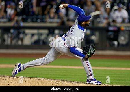 Texas Rangers pitcher Aroldis Chapman (45) reacts against the New York Mets  during the ninth inning of a baseball game on Tuesday, Aug. 29, 2023, in  New York. The Rangers won 2-1. (