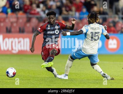 Toronto, Canada. 30th Aug, 2023. Deandre Kerr (L) of Toronto FC shoots to score during the 2023 Major League Soccer(MLS) match between Toronto FC and Philadelphia Union at BMO Field in Toronto, Canada, on Aug. 30, 2023. Credit: Zou Zheng/Xinhua/Alamy Live News Stock Photo