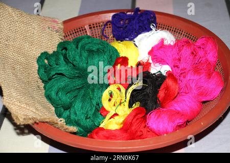 A bowl of colorful yarn. Stock Photo