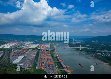 CHONGQING, CHINA - JUNE 23, 2023 - (FILE) Photo taken on June 23, 2023 shows the working scene of Guoyuan Port container hoisting operation area in Li Stock Photo