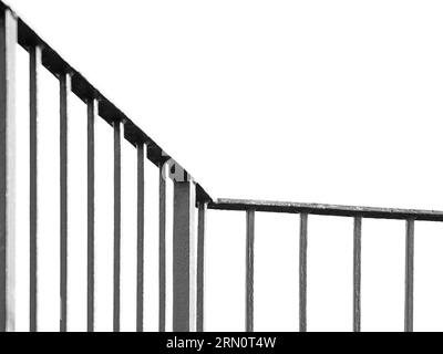 black and white image of railing or handrail isolated on white background as lines, minimalism, decision, fence, safety concept with copy space Stock Photo