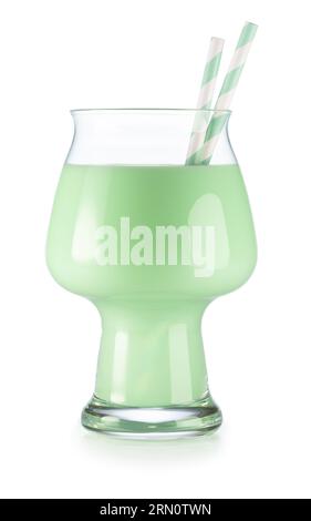 Glass of mint milk shake with two paper drinking straws isolated on white background. Refreshing mocktail. Stock Photo