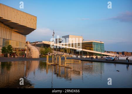 Oslo, Norway, June 20, 2023: The Oslo Public Library, Norway's first and largest library and the Oslo Opera House, which was built in 2008 with the in Stock Photo