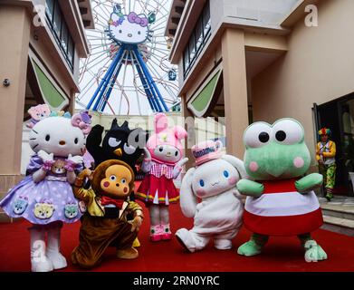 (141128) -- ANJI, Nov. 28, 2014 -- Staff members in cartoon character outfits are seen at a ceremony marking the completion of a Hello Kitty theme park in Anji, east China s Zhejiang Province, Nov. 28, 2014. The first of its kind in China, the Hello Kitty theme park in Anji is scheduled to open on Jan. 1, 2015, as more than a million visitors are expected per year. ) (lmm) CHINA-ZHEJIANG-ANJI-HELLO KITTY-THEME PARK-COMPLETION (CN) XuxYu PUBLICATIONxNOTxINxCHN   Anji Nov 28 2014 Staff Members in Cartoon Character Outfits are Lakes AT a Ceremony marking The completion of a Hello Kitty Theme Park Stock Photo