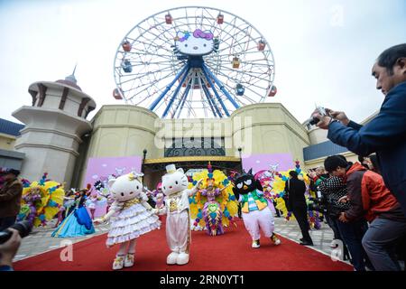 (141128) -- ANJI, Nov. 28, 2014 -- Staff members in cartoon character outfits stage a performance at a ceremony marking the completion of a Hello Kitty theme park in Anji, east China s Zhejiang Province, Nov. 28, 2014. The first of its kind in China, the Hello Kitty theme park in Anji is scheduled to open on Jan. 1, 2015, as more than a million visitors are expected per year. ) (lmm) CHINA-ZHEJIANG-ANJI-HELLO KITTY-THEME PARK-COMPLETION (CN) XuxYu PUBLICATIONxNOTxINxCHN   Anji Nov 28 2014 Staff Members in Cartoon Character Outfits Stage a Performance AT a Ceremony marking The completion of a H Stock Photo