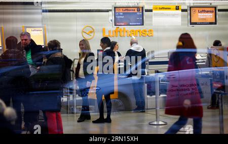 (141201) -- BERLIN, Dec. 1, 2014 -- Passengers gather near Lufthansa s check-in desks in Tegel airport, Berlin, Germany, on Dec. 1, 2014. German airline Lufthansa said on Monday that it had canceled nearly half of its scheduled flights on Monday and Tuesday due to a strike by its pilots. ) GERMANY-BERLIN-LUFTHANSA-STRIKE ZhangxFan PUBLICATIONxNOTxINxCHN   Berlin DEC 1 2014 Passengers gather Near Lufthansa S Check in desks in Tegel Airport Berlin Germany ON DEC 1 2014 German Airline Lufthansa Said ON Monday Thatcher IT had canceled parishioners Half of its scheduled Flights ON Monday and Tuesda Stock Photo