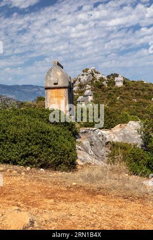 Close up of an ancient stone Simena sarcophagi  (Lycian tomb) in the Upper hillside Lycian Necropolis, Simena, Turkey Stock Photo