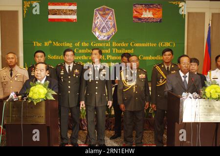 (141224) -- PHNOM PENH, Dec. 24, 2014 -- Cambodian Defense Minister Tea Banh (R front) and his visiting Thai counterpart Prawit Wongsuwan (L front) hold a joint press conference in Phnom Penh, Cambodia, Dec. 24, 2014. Tea Banh and Prawit Wongsuwan on Wednesday pledged to enhance security and maintain peace along the border of the two countries. ) CAMBODIA-PHNOM PENH-THAILAND-PRESS CONFERENCE Sovannara PUBLICATIONxNOTxINxCHN   Phnom Penh DEC 24 2014 Cambodian Defense Ministers Tea Banh r Front and His Visiting Thai Part Prawit Wongsuwan l Front Hold a Joint Press Conference in Phnom Penh Cambod Stock Photo