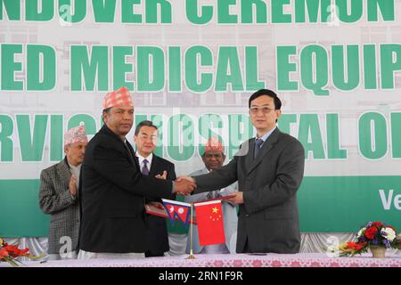 (141226) -- KATHMANDU, Dec. 26, 2014 -- Chinese Ambassador to Nepal Wu Chuntai (R Front) shakes hands with Nepal s General Administration Secretary Nagendra Upadhyay during the medical appliance handover ceremony in Kathmandu, Nepal, Dec. 26, 2014. Chinese Foreign Minister Wang Yi (C Back) on Friday handed over medical equipment worth 200 million Nepalese rupees (19,700 U.S. dollars) to Nepalese Minister for General Administration Lal Babu Pandit in Kathmandu. ) (zhf) NEPAL-CHINA-MEDICAL APPLIANCE-HANDOVER PratapxThapa PUBLICATIONxNOTxINxCHN   Kathmandu DEC 26 2014 Chinese Ambassador to Nepal Stock Photo