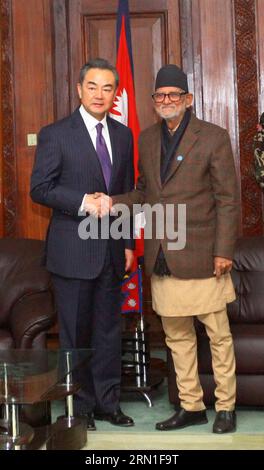 (141226) -- KATHMANDU, Dec. 26, 2014 -- Visiting Chinese Foreign Minister Wang Yi (L) shakes hands with Nepalese Prime Minister Sushil Koirala at the Prime Minister s office in Kathmandu, Nepal, Dec. 26, 2014. A Chinese delegation led by Foreign Minister Wang Yi arrived here on Thursday for a three-day official goodwill visit, the highest level one from the Chinese side after the election of Nepal s Constituent Assembly in November 2013. ) NEPAL-KATHMANDU-CHINESE FM-PRIME MINISTER-MEETING SunilxSharma PUBLICATIONxNOTxINxCHN   Kathmandu DEC 26 2014 Visiting Chinese Foreign Ministers Wang Yi l S Stock Photo