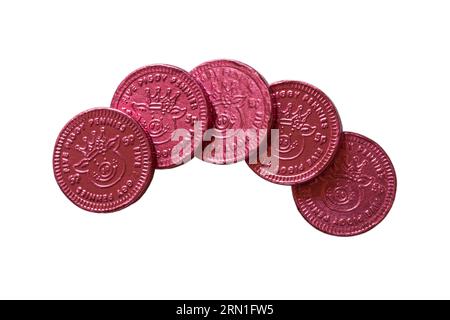 Percy Pig pennies fruit flavoured chocolate pennies from M&S isolated on white background - five piggy pennies 5p Stock Photo