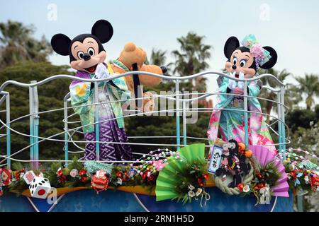 (150101) -- TOKYO, Jan. 1, 2015 -- Disney characters wave to guests on a float during a New Year parade at Tokyo Disneyland in Tokyo, Japan on Jan. 1, 2015. )(bxq) JAPAN-TOKYO-NEW YEAR-DISNEY MaxPing PUBLICATIONxNOTxINxCHN   Tokyo Jan 1 2015 Disney characters Wave to Guests ON a Float during a New Year Parade AT Tokyo Disneyland in Tokyo Japan ON Jan 1 2015  Japan Tokyo New Year Disney  PUBLICATIONxNOTxINxCHN Stock Photo