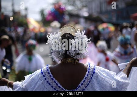 (150111) -- LAS TABLAS, Jan. 10, 2015 -- A woman wearing the traditional dress of La Pollera takes part in the Parade of the Thousand Polleras , in Las Tablas city, Los Santos province, Panama, on Jan. 10, 2015. According to local press, over 10,000 women wearing the traditional dress of La Pollera took part in the Parade of the Thousand Polleras . Valenzuela) (da) PANAMA-LAS TABLAS-CULTURE-PARADE Mauricio PUBLICATIONxNOTxINxCHN   Las Tablas Jan 10 2015 a Woman Wearing The Traditional Dress of La Pollera Takes Part in The Parade of The Thousand  in Las Tablas City Los Santos Province Panama ON Stock Photo