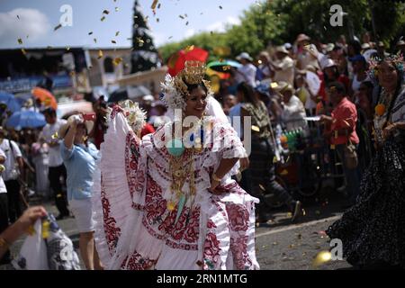 (150111) -- LAS TABLAS, Jan. 10, 2015 -- A woman wearing the traditional dress of La Pollera takes part in the Parade of the Thousand Polleras , in Las Tablas city, Los Santos province, Panama, on Jan. 10, 2015. According to local press, over 10,000 women wearing the traditional dress of La Pollera took part in the Parade of the Thousand Polleras . Valenzuela) (da) PANAMA-LAS TABLAS-CULTURE-PARADE Mauricio PUBLICATIONxNOTxINxCHN   Las Tablas Jan 10 2015 a Woman Wearing The Traditional Dress of La Pollera Takes Part in The Parade of The Thousand  in Las Tablas City Los Santos Province Panama ON Stock Photo