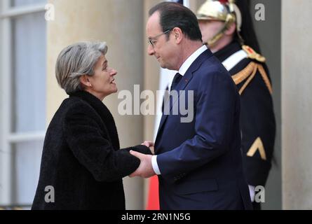 (150111) -- PARIS, Jan. 11, 2015 -- French President Francois Hollande (R) welcomes UNESCO Director-General Irina Bokova at the Elysee Palace in Paris, France, Jan. 11, 2015. A massive march commenced Sunday afternoon in Paris with the participation of French President Francois Hollande and leaders from dozens of foreign countries. More than a million French would walk in the streets of Paris in honor of the 17 victims killed during the three days deadly terrorist attack. ) FRANCE-PARIS-MARCH AGAINST EXTREMISM ChenxXiaowei PUBLICATIONxNOTxINxCHN   Paris Jan 11 2015 French President François Ho Stock Photo