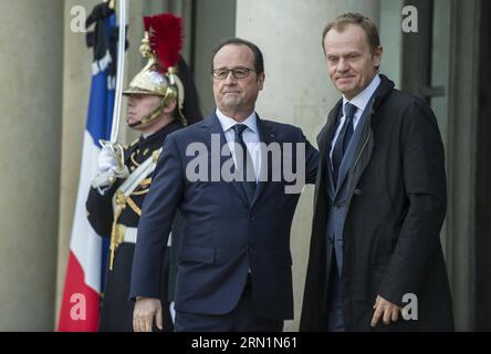 (150111) -- PARIS, Jan. 11, 2015 -- French President Francois Hollande(L) welcomes European Council President Tusk at the Elysee Palace in Paris, France, Jan. 11, 2015. A massive march commenced Sunday afternoon in Paris with the participation of French President Francois Hollande and leaders from dozens of foreign countries. More than a million French would walk in the streets of Paris in honor of the 17 victims killed during the three days deadly terrorist attack. ) FRANCE-PARIS-MARCH AGAINST EXTREMISM ChenxXiaowei PUBLICATIONxNOTxINxCHN   Paris Jan 11 2015 French President François Hollande Stock Photo