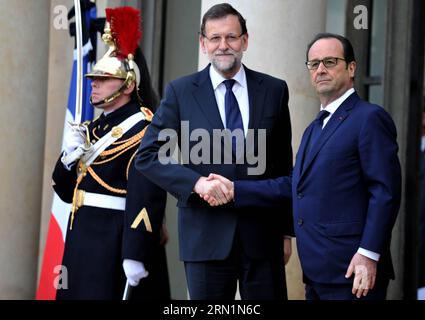 (150111) -- PARIS, Jan. 11, 2015 -- French President Francois Hollande(R) welcomes Spanish Prime Minister Mariano Rajoy at the Elysee Palace in Paris, France, Jan. 11, 2015. A massive march commenced Sunday afternoon in Paris with the participation of French President Francois Hollande and leaders from dozens of foreign countries. More than a million French would walk in the streets of Paris in honor of the 17 victims killed during the three days deadly terrorist attack. ) FRANCE-PARIS-MARCH AGAINST EXTREMISM ChenxXiaowei PUBLICATIONxNOTxINxCHN   Paris Jan 11 2015 French President François Hol Stock Photo