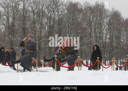 ST. PETERSBURG, Jan. 27, 2015 -- Valentina Matviyenko (1st R), chairwoman of the Federation Council of the Russian Federation, attends a ceremony to mark the 71st anniversary of the end of the Leningrad Blockade at the Piskaryovskoye Memorial Cemetery in St. Petersburg, Russia, Jan. 27, 2015. Leningrad, known as St. Petersburg today, was sieged by the Nazis in September 1941. The city struggled for nearly 900 days thereafter and lifted the Nazis blockade on Jan. 27, 1944. The siege had led to the death of more than 600,000 Soviet civilians and servicemen. ) (lmm) RUSSIA-ST. PETERSBURG-LENINGRA Stock Photo