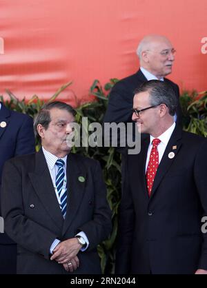 Cuba s Vice Foreign minister Abelardo Moreno (L) speaks with his Costa Rican counterpart Manuel Gonzalez (R) during a group photo session for foreign ministers on the sidelines of the 3rd Summit of the Community of Latin American and Caribbean States (CELAC, for its acronym in Spanish), in San Antonio de Belen, Heredia Province, 20 km northwest of San Jose, capital of Costa Rica, on Jan. 27, 2015. Leaders of Latin American and Caribbean States will attend the 3rd CELAC summit here on Wednesday and Thursday. ) (da) COSTA RICA-SAN ANTONIO DE BELEN-POLITICS-CELAC-SUMMIT KENTxGILBERT PUBLICATIONxN Stock Photo