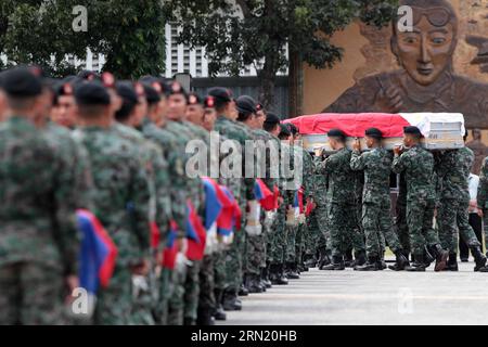 (150129) -- PASAY CITY, Jan. 29, 2015 -- Members of the Philippine National Police Special Action Force (PNP-SAF) carry the caskets of their fallen comrades at the Villamor Air Base in Pasay City, the Philippines, Jan. 29, 2015. Forty-four members of the PNP-SAF were killed allegedly by Moro Islamic Liberation Front and Bangsamoro Islamic Freedom Fighters members on Jan. 25 in Mamasapano, Maguindanao. ) PHILIPPINES-PASAY CITY-POLICE RouellexUmali PUBLICATIONxNOTxINxCHN   Pasay City Jan 29 2015 Members of The Philippine National Police Special Action Force PNP SAF Carry The casket of their Fall Stock Photo
