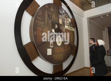 (150130) -- ZAGREB, Jan. 30, 2015 -- Visitors read about Croatian American inventor Nikola Tesla on the occasion of the 10th Museum Night at the Technical Museum in Zagreb, capital of Croatia, Jan. 30, 2015. Museum Night is an annual event that offers people a chance to visit more than 200 Croatian museums free of charge. ) CROATIA-ZAGREB-MUSEUM NIGHT MisoxLisanin PUBLICATIONxNOTxINxCHN   Zagreb Jan 30 2015 Visitors Read About Croatian American inventor Nikola Tesla ON The Occasion of The 10th Museum Night AT The Technical Museum in Zagreb Capital of Croatia Jan 30 2015 Museum Night IS to Annu Stock Photo