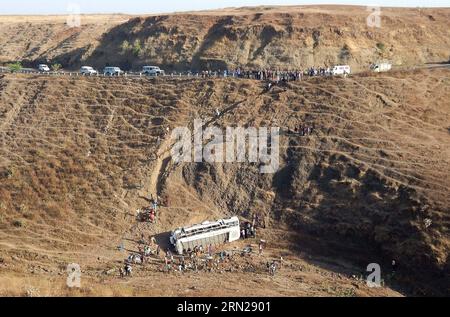 (150217) -- DHAR, Feb. 17, 2015 -- People gather around the site of a bus accident at Dhar district in India s central state of Madhya Pradesh, on Feb. 17, 2015. A private bus with around 55 to 60 passengers on board plunged into a gorge in the central Indian state of Madhya Pradesh Monday night, killing at least 10 and injuring 33 others, said police Tuesday. )(zhf) INDIA-DHAR-BUS ACCIDENT Stringer PUBLICATIONxNOTxINxCHN   150217 Dhar Feb 17 2015 Celebrities gather Around The Site of a Bus accident AT Dhar District in India S Central State of Madhya Pradesh ON Feb 17 2015 a Private Bus With A Stock Photo