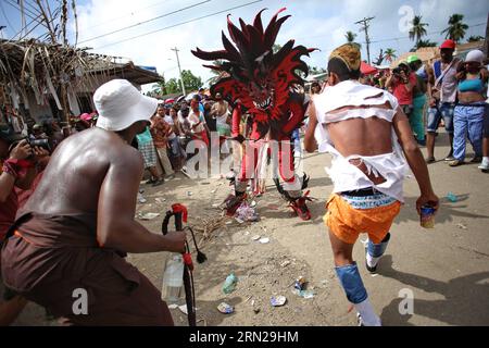 COLON, Feb. 18, 2015 -- A dancer in devil costume takes part in the Ash Wednesday celebration at Nombre de Dios village, Colon province, Panama, on Feb. 18, 2015. The dance of the Devil and Congo represents the way in which African slaves and runaway salves mocking their masters during the colonial period, performing the good with the congos and the evil with the devil figure, according to local press. ) (fnc) PANAMA-COLON-SOCIETY-ASH WEDNESDAY MAURICIOxVALENZUELA PUBLICATIONxNOTxINxCHN   Colon Feb 18 2015 a Dancer in Devil costume Takes Part in The Ash Wednesday Celebration AT Nombre de Dios Stock Photo