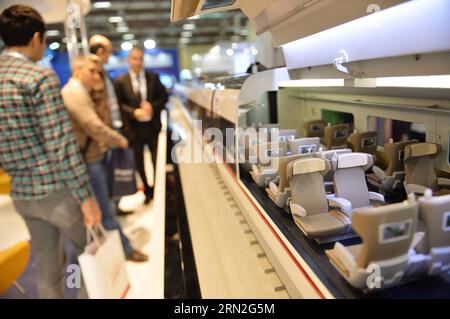 (150305) -- ISTANBUL, March 5, 2015 -- Guests watch a model of train during the opening ceremony of the 5th International Rolling Stock, Infrastructure and Logistic Exhibition in Istanbul, Turkey on March 5, 2015. More than 200 companies from 25 countries and regions including China, Germany, Hungary, and Romania participated in the fair. ) TURKEY-ISTANBUL-RAILWAY-EXHIBITION LuxZhe PUBLICATIONxNOTxINxCHN   Istanbul March 5 2015 Guests Watch a Model of Train during The Opening Ceremony of The 5th International Rolling Stick Infrastructure and Logistic Exhibition in Istanbul Turkey ON March 5 20 Stock Photo