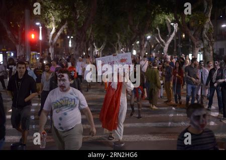 People attend the sixth annual Zombie Walk along the street of central Tel Aviv, Israel, on March 7, 2015. JINI/) (lrz) ISRAEL-TEL AVIV-ZOMBIE WALK TomerxNeuberg PUBLICATIONxNOTxINxCHN   Celebrities attend The sixth Annual Zombie Walk Along The Street of Central Tel Aviv Israel ON March 7 2015 Jini  Israel Tel Aviv Zombie Walk  PUBLICATIONxNOTxINxCHN Stock Photo