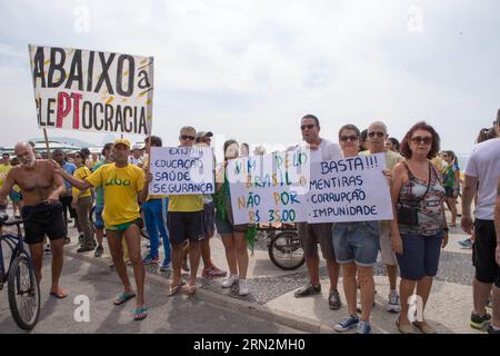 (150315) -- RIO DE JANEIRO, March 15, 2015 -- Protesters march with banners written down kleptocracy , demand education, health, security and enough lies, corruption and impunity during an anti-government demonstration in Rio de Janeiro, Brazil, March 15, 2015. A demonstration was held here at Copacabana beach on Sunday. ) BRAZIL-RIO DE JANEIRO-DEMONSTRATION XuxZijian PUBLICATIONxNOTxINxCHN   Rio de Janeiro March 15 2015 protesters March With Banners written Down  Demand Education Health Security and Enough Lies Corruption and impunity during to Anti Government Demonstration in Rio de Janeiro Stock Photo