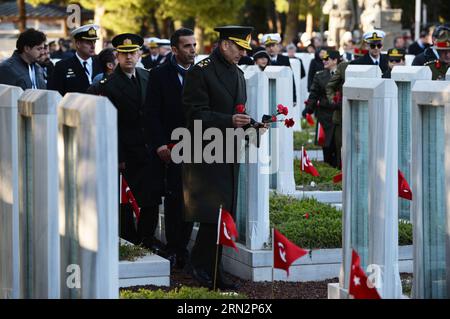 (150319) -- CANAKKALE,   Military officers put flowers at the martyrs cemetery after the commemoration ceremony for the 100th anniversary of Gallipoli Campaign in Canakkale March 18, 2015. Turkey on Wednesday commemorated the 100th anniversary of Gallipoli Campaign by the Allies in World War I in the southwestern town of Canakkale. More than 1,000 people including soldiers and government officials joined the commemoration ceremony in Canakkale, about 340 kilometers southwest of Istanbul. The Gallipoli Campaign, also known as the Dardanelles Campaign, was a battle in World War I that took place Stock Photo