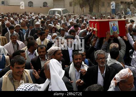 (150323) -- SANAA, March 23, 2015 -- People carry a coffin during a funeral for victims in the suicide bombing attacks on mosques on Friday in Sanaa, Yemen, on March 23, 2015. The Yemeni people held a funeral for those who were killed in suicide bombing attacks in Sanaa on Friday. The Islamic State launched four bombing attacks in Yemen on Friday that killed at least 154 people and wounded 350 others. ) YEMEN-SANAA-ATTACKS-VICTIMS-FUNERAL HanixAli PUBLICATIONxNOTxINxCHN   Sanaa March 23 2015 Celebrities Carry a Coffin during a Funeral for Victims in The Suicide Bombing Attacks ON Mosques ON Fr Stock Photo