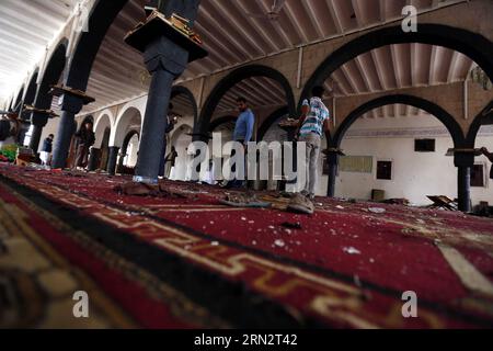 (150323) -- SANAA, March 23, 2015 -- People clean the mosque that was attacked by Friday suicide bombings in Sanaa, Yemen, on March 23, 2015. The Yemeni people held a funeral for those who were killed in suicide bombing attacks in Sanaa on Friday. The Islamic State launched four bombing attacks in Yemen on Friday that killed at least 154 people and wounded 350 others. ) YEMEN-SANAA-ATTACKS-VICTIMS-FUNERAL HanixAli PUBLICATIONxNOTxINxCHN   Sanaa March 23 2015 Celebrities Clean The Mosque Thatcher what attacked by Friday Suicide bombings in Sanaa Yemen ON March 23 2015 The Yemeni Celebrities Her Stock Photo