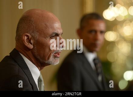 (150324) -- WASHINGTON D.C., March. 24, 2015 -- U.S. President Barack Obama(R) listens as Afghan President Ashraf Ghani speaks during a joint press conference in the East Room of White House in Washington D.C., the United States, March 24, 2015. U.S. President Barack Obama announced Tuesday no drawdown of the current 9,800 U.S. troops stationed in Afghanistan will occur through the end of 2015. ) U.S.-WASHINGTON D.C.-OBAMA-GHANI-PRESS CONFERENCE YinxBogu PUBLICATIONxNOTxINxCHN   Washington D C March 24 2015 U S President Barack Obama r listens As Afghan President Ashraf Ghani Speaks during a J Stock Photo