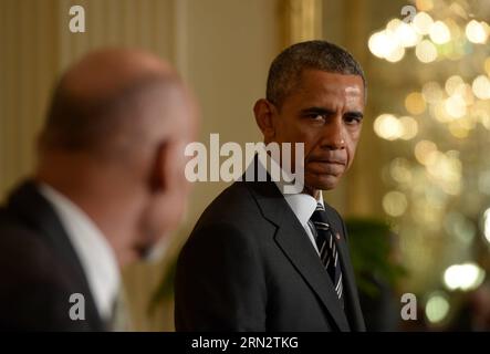 (150324) -- WASHINGTON D.C., March. 24, 2015 -- U.S. President Barack Obama(R) listens as Afghan President Ashraf Ghani speaks during a joint press conference in the East Room of White House in Washington D.C., the United States, March 24, 2015. U.S. President Barack Obama announced Tuesday no drawdown of the current 9,800 U.S. troops stationed in Afghanistan will occur through the end of 2015. ) U.S.-WASHINGTON D.C.-OBAMA-GHANI-PRESS CONFERENCE YinxBogu PUBLICATIONxNOTxINxCHN   Washington D C March 24 2015 U S President Barack Obama r listens As Afghan President Ashraf Ghani Speaks during a J Stock Photo