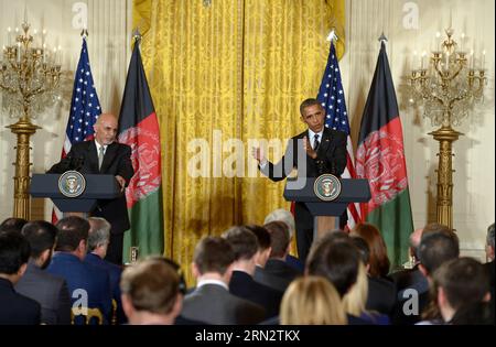 (150324) -- WASHINGTON D.C., March. 24, 2015 -- U.S. President Barack Obama(R) speaks as Afghan President Ashraf Ghani listens during a joint press conference in the East Room of White House in Washington D.C., the United States, March 24, 2015. U.S. President Barack Obama announced Tuesday no drawdown of the current 9,800 U.S. troops stationed in Afghanistan will occur through the end of 2015. ) U.S.-WASHINGTON D.C.-OBAMA-GHANI-PRESS CONFERENCE YinxBogu PUBLICATIONxNOTxINxCHN   Washington D C March 24 2015 U S President Barack Obama r Speaks As Afghan President Ashraf Ghani listens during a J Stock Photo