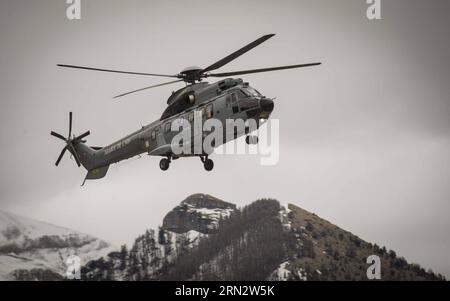 (150325) -- SEYNE-LES-ALPES, March 25, 2015 -- French President Francois Hollande and German Chancellor Angela Merkel s helicopter arrives in Seyne-les-Alpes, France, on March 25, 2015. French President Francois Hollande, German Chancellor Angela Merkel and Spanish Prime Minister Mariano Rajoy arrived Wednesday afternoon in Seyne-Les-Alpes, the site of an operation center for Germanwings crashed A320 in southern France. ) FRANCE-SEYNE-LES-ALPES-HOLLANDE-MERKEL-RAJOY-VISIT-OPERATION CENTER ChenxXiaowei PUBLICATIONxNOTxINxCHN   Seyne Les Alpes March 25 2015 French President François Hollande and Stock Photo