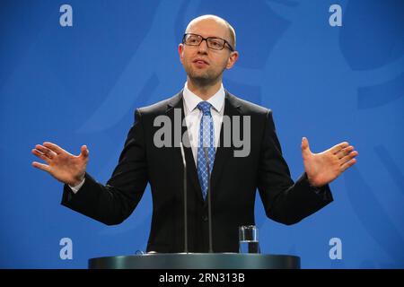 (150401) -- BERLIN, April 1, 2015 -- Ukrainian Prime Minister Arseniy Yatsenyuk attends the press conference after meeting with German Chancellor Angela Merkel (not in picture) at the Chancellory, Berlin, Germany, on April 1, 2015. ) GERMANY-BERLIN-UKRAINE-PM-PRESS CONFERENCE ZhangxFan PUBLICATIONxNOTxINxCHN   Berlin April 1 2015 Ukrainian Prime Ministers Arseniy Yatsenyuk Attends The Press Conference After Meeting With German Chancellor Angela Merkel Not in Picture AT The Chancellory Berlin Germany ON April 1 2015 Germany Berlin Ukraine PM Press Conference  PUBLICATIONxNOTxINxCHN Stock Photo