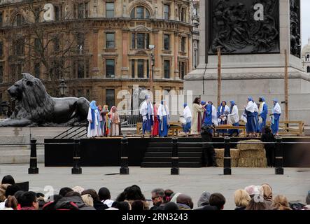 (150403) -- LONDON, APRIL 3, 2015 -- Actors perform The Passion of Jesus marking Good Friday in Trafalgar Square in London, Britain, on April 3, 2015. Good Friday is a Christian holiday before Easter Sunday, which commemorates the crucifixion of Jesus Christ on the cross. The Wintershall s theatrical production of The Passion of Jesus includes a cast of 100 actors, horses, a donkey and authentic costumes of Roman soldiers in the 12th Legion of the Roman Army. ) BRITAIN-LONDON-EASTER-GOOD FRIDAY-THE PASSION OF JESUS-PERFORMANCE HanxYan PUBLICATIONxNOTxINxCHN   London April 3 2015 Actors perform Stock Photo