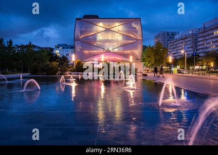 France, Herault, Montpellier, Port Marianne district, Le Nuage building by designer Philippe Starck, the water mirror in the foreground on avenue Raymond Dugrand Stock Photo