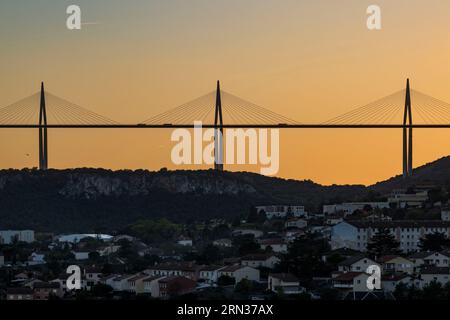 France, Aveyron, Grands Causses regional natural park, Millau city and the Millau viaduct by architects Michel Virlogeux and Norman Foster in the background Stock Photo